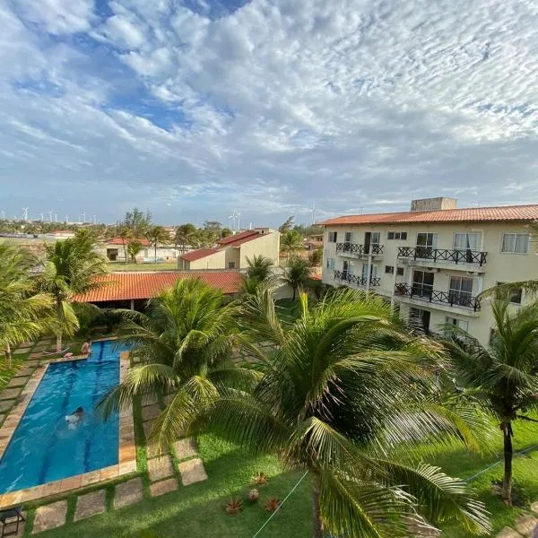 Apartamento com vista para o mar, piscina , deck , playground e estacionamento .