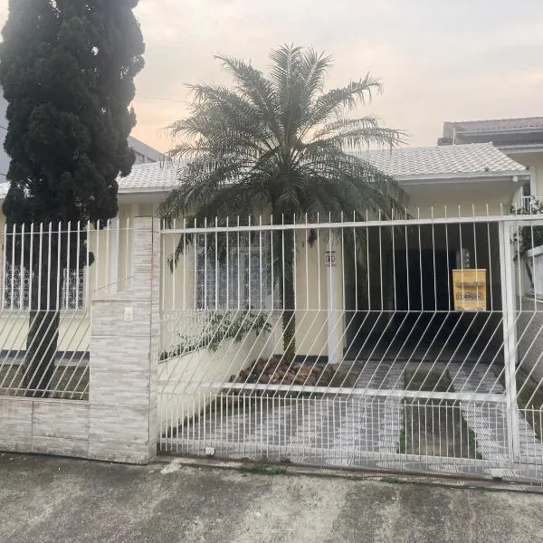 Quarto em casa ampla e confortável compartilhada